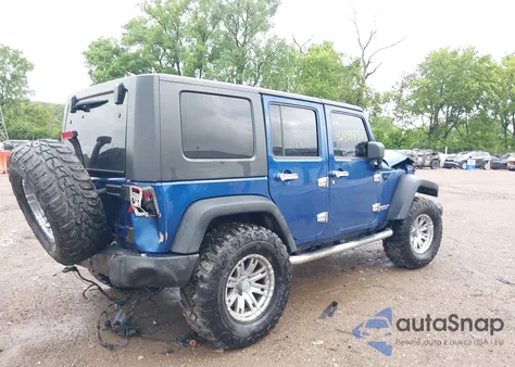 2010 Jeep Wrangler Unlimited Sport z USA, uszkodzony, nr VIN 1J4BA3H15AL152421